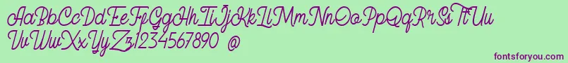 Arkland FREE Font – Purple Fonts on Green Background