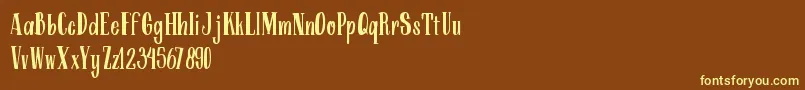 ARKMishaDemo Regular-fontti – keltaiset fontit ruskealla taustalla