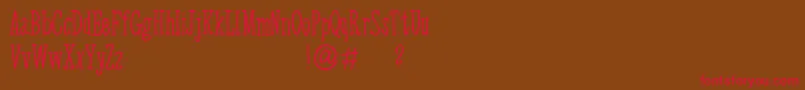 フォントArktivity – 赤い文字が茶色の背景にあります。