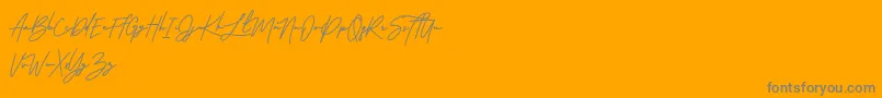 Arlobuns Free-Schriftart – Graue Schriften auf orangefarbenem Hintergrund