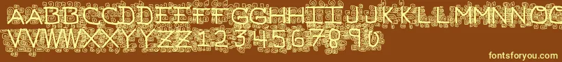PfVeryverybadfont19-fontti – keltaiset fontit ruskealla taustalla