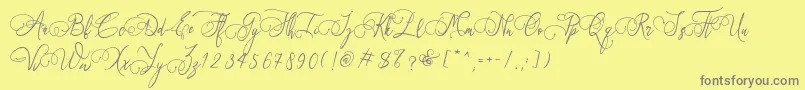 Art Maria Font – Gray Fonts on Yellow Background