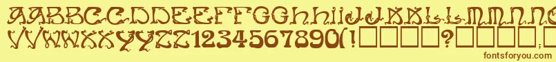 Art Nouveau Caps Font – Brown Fonts on Yellow Background