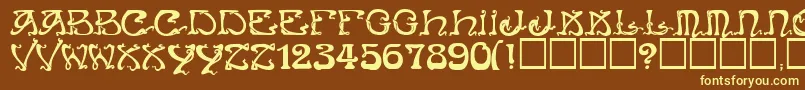 Art Nouveau Caps Font – Yellow Fonts on Brown Background