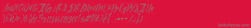 Arthands-Schriftart – Graue Schriften auf rotem Hintergrund