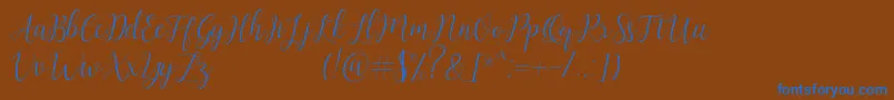 Artilla Font – Blue Fonts on Brown Background