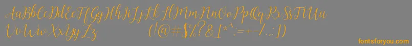 Artilla Font – Orange Fonts on Gray Background