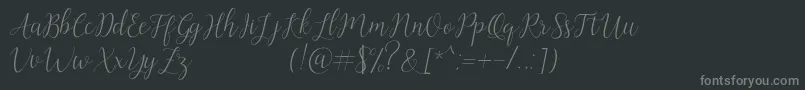 フォントArtilla – 黒い背景に灰色の文字