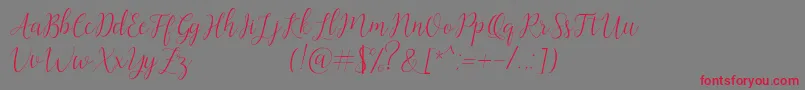 Artilla-Schriftart – Rote Schriften auf grauem Hintergrund