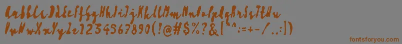 Artisoya Three-Schriftart – Braune Schriften auf grauem Hintergrund