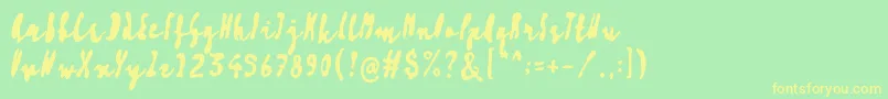 Artisoya Three Font – Yellow Fonts on Green Background