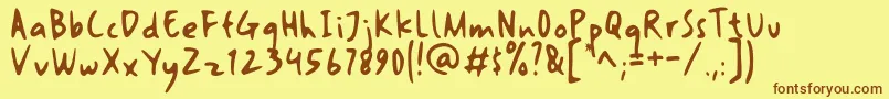 artomoro Font – Brown Fonts on Yellow Background