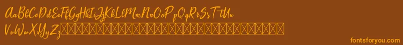 Artopyl Demo Font – Orange Fonts on Brown Background