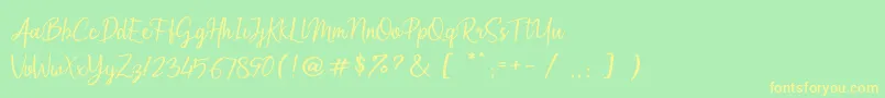 Arumdalu Font – Yellow Fonts on Green Background