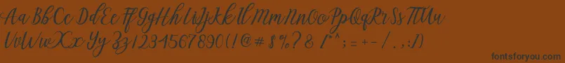 Aseline Script Font – Black Fonts on Brown Background
