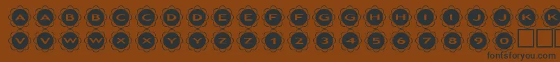 asflowers-Schriftart – Schwarze Schriften auf braunem Hintergrund