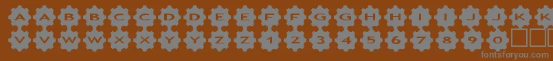 asgears3-fontti – harmaat kirjasimet ruskealla taustalla