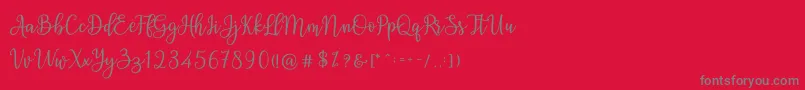 Ashadiya Font – Gray Fonts on Red Background