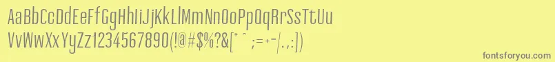 Ashemark regular-fontti – harmaat kirjasimet keltaisella taustalla