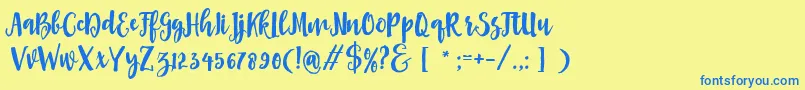 Asly Brush Font – Blue Fonts on Yellow Background