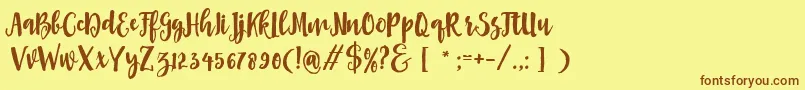 Asly Brush Font – Brown Fonts on Yellow Background