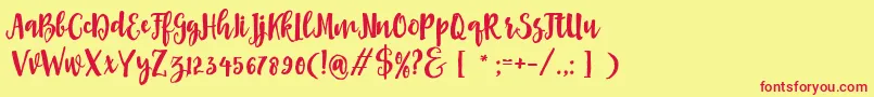 Asly Brush Font – Red Fonts on Yellow Background