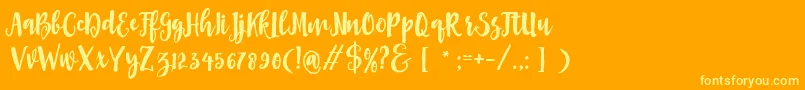 Asly Brush Font – Yellow Fonts on Orange Background