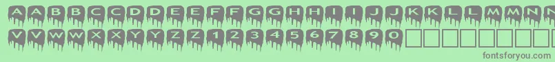 asmeltdowns Font – Gray Fonts on Green Background