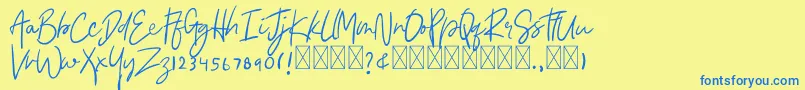 Asmudila Font – Blue Fonts on Yellow Background