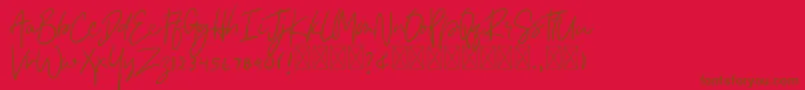 Asmudila Font – Brown Fonts on Red Background