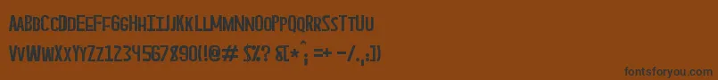 フォントAsperian – 黒い文字が茶色の背景にあります