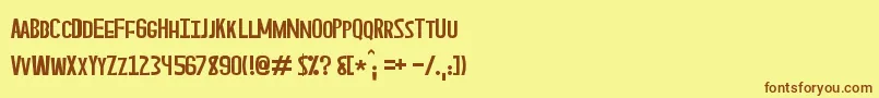 フォントAsperian – 茶色の文字が黄色の背景にあります。