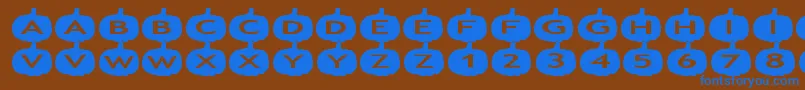 Weitere Informationen zur aspumpkins-Schriftart aspumpkins-Schriftart – Blaue Schriften auf braunem Hintergrund
