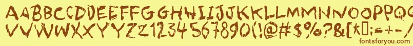 フォントasqualt – 茶色の文字が黄色の背景にあります。