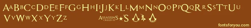 Assassin$-fontti – keltaiset fontit ruskealla taustalla