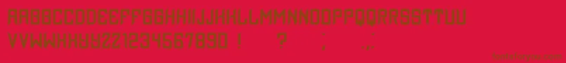 Assyrian-fontti – ruskeat fontit punaisella taustalla