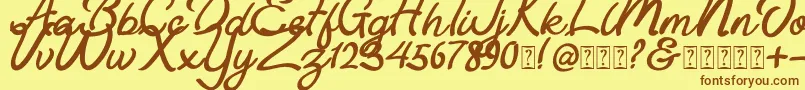 Astania Script Font – Brown Fonts on Yellow Background