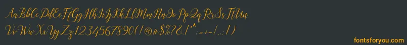フォントAstereiska – 黒い背景にオレンジの文字