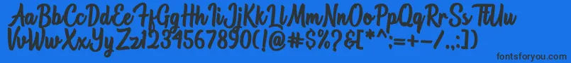 Astonia Font – Black Fonts on Blue Background