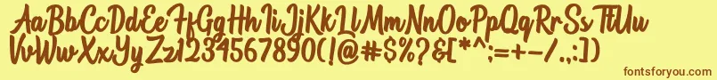 Astonia Font – Brown Fonts on Yellow Background