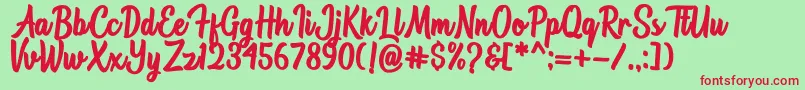 Astonia Font – Red Fonts on Green Background