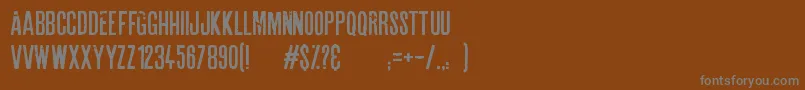 Saiba mais sobre a fonte Astounding news Fonte Astounding news – fontes cinzas em um fundo marrom
