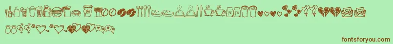 Astrokids Doodle-fontti – ruskeat fontit vihreällä taustalla