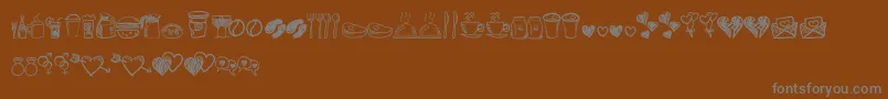 Weitere Informationen zur Astrokids Doodle-Schriftart Astrokids Doodle-Schriftart – Graue Schriften auf braunem Hintergrund
