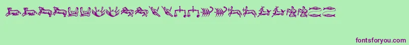 Astrologicus-fontti – violetit fontit vihreällä taustalla