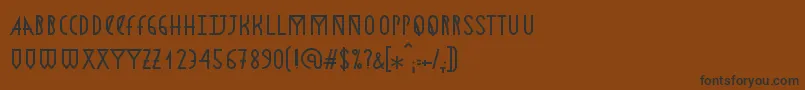 Шрифт Astronmica – чёрные шрифты на коричневом фоне