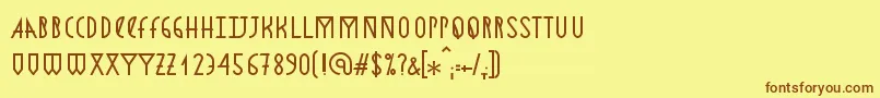 フォントAstronmica – 茶色の文字が黄色の背景にあります。