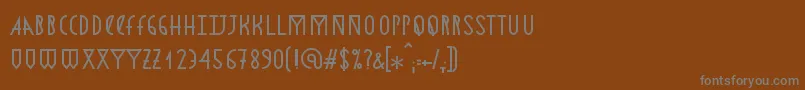 フォントAstronmica – 茶色の背景に灰色の文字