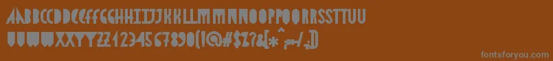 フォントAstronmicaBlack – 茶色の背景に灰色の文字