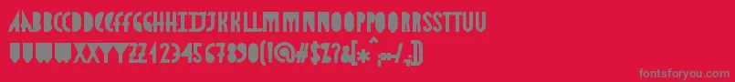 AstronmicaBlack Font – Gray Fonts on Red Background